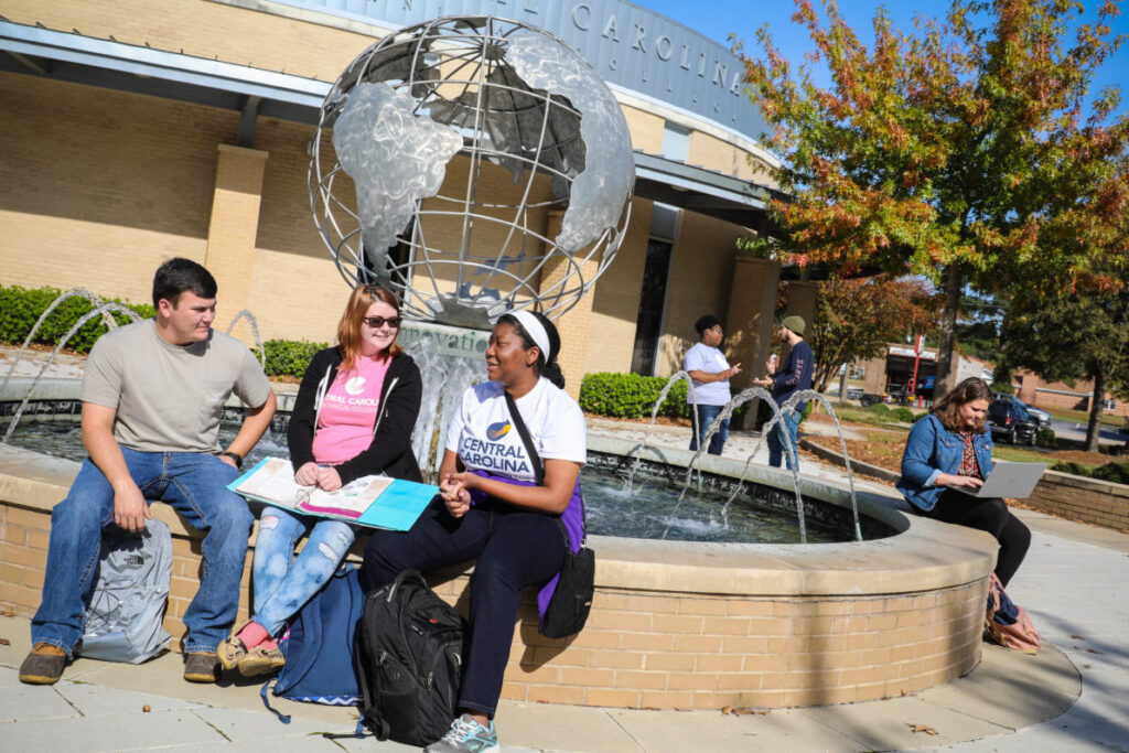 students sitting on campus